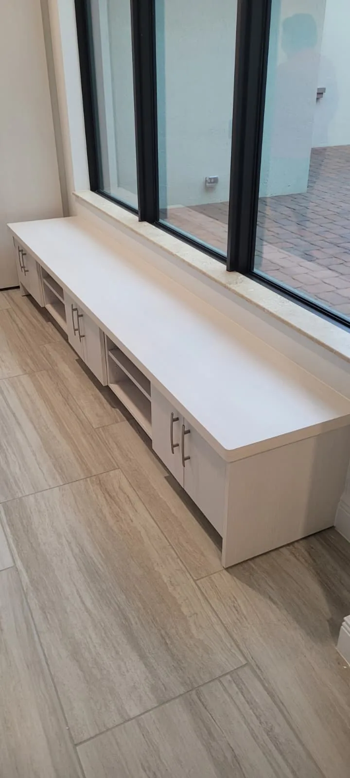 Built-in window bench with storage drawers